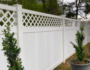 white tacoma style fence