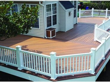 large outdoor deck with white fencing