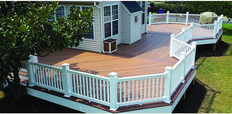 large outdoor deck with white fencing