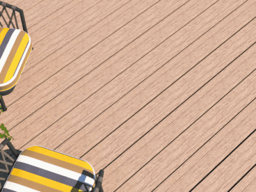 light brown composite deck with yellow striped chairs