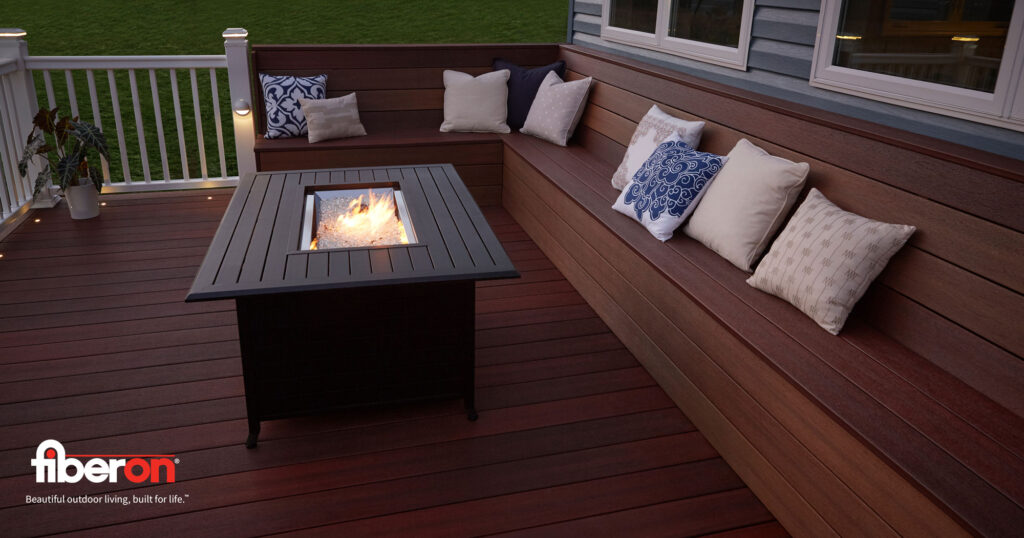A Fiberon graphic of a modern deck seating area with a central fire pit.