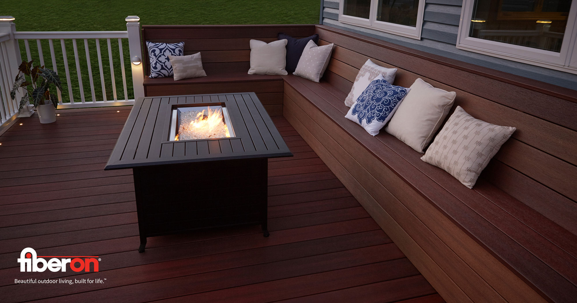A Fiberon graphic of a modern deck seating area with a central fire pit.