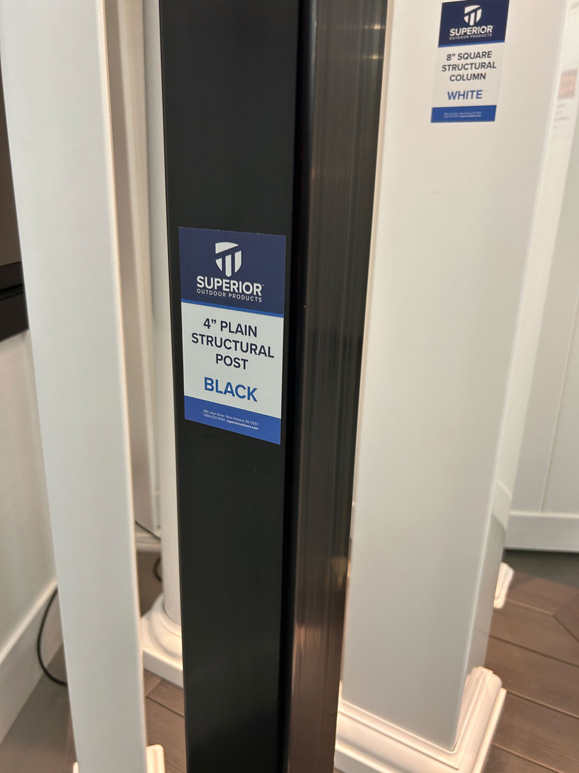 A close up shot of a black Superior Outdoor Products structural post.