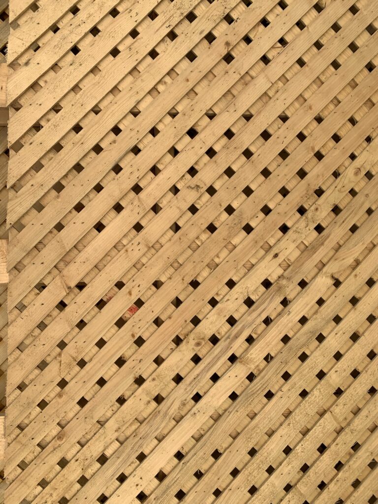A wooden lattice privacy wall.
