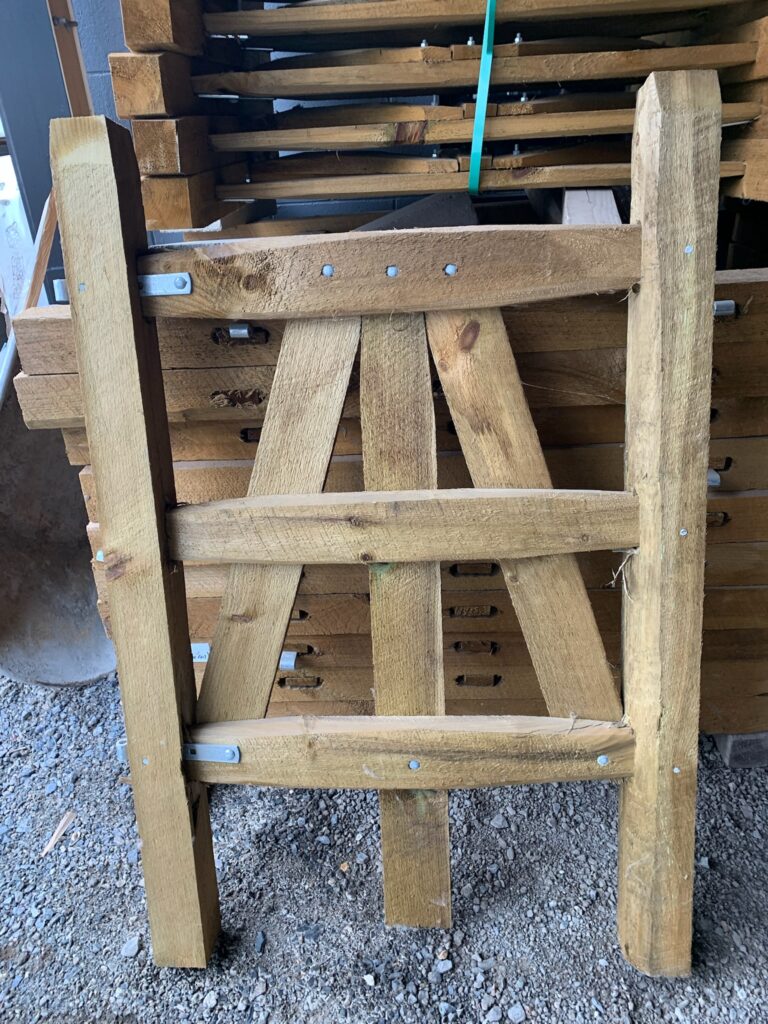 A smaller, wooden split rail fence sample at Ladiesburg Lumber.