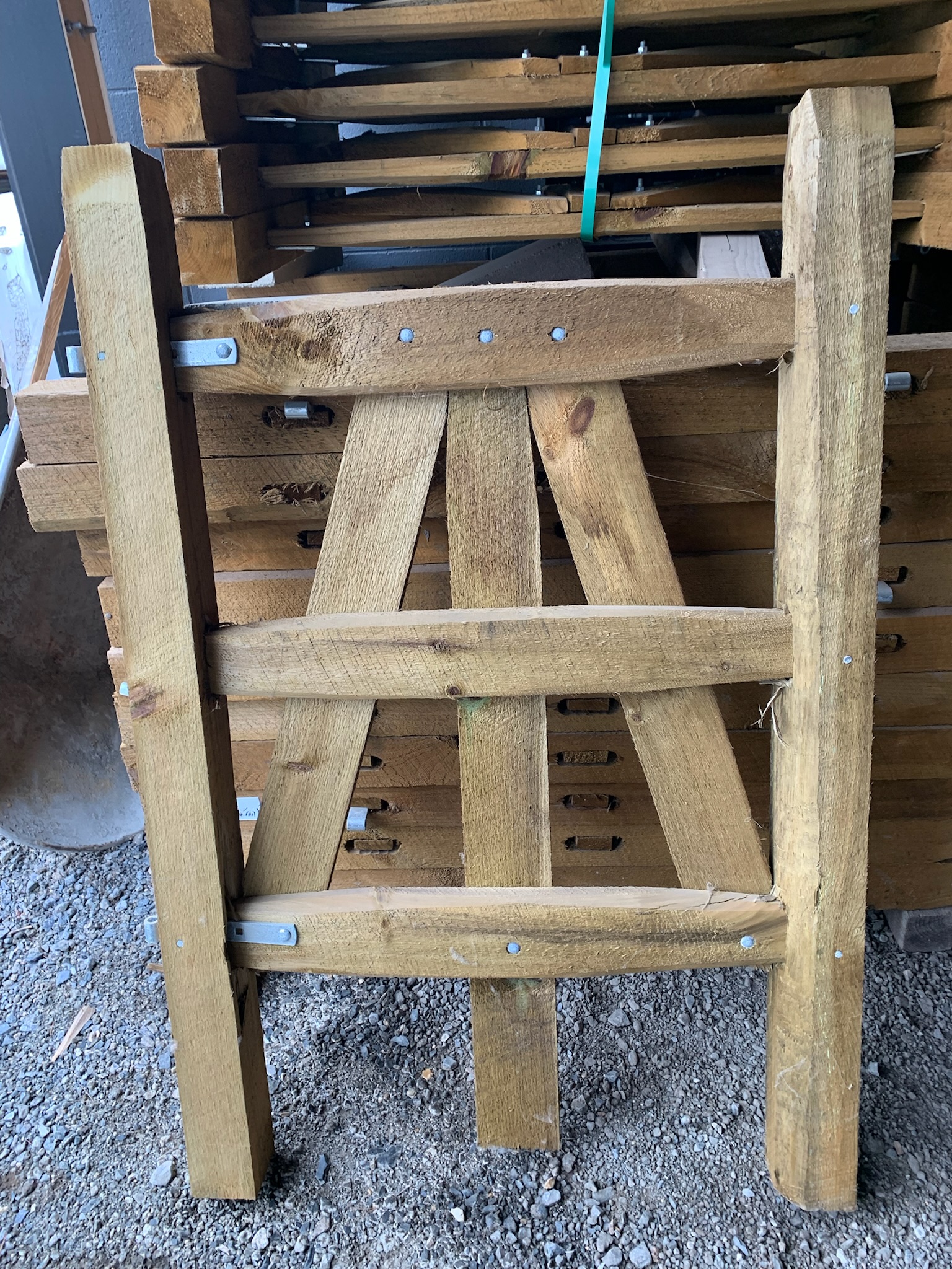 A smaller, wooden split rail fence sample at Ladiesburg Lumber.