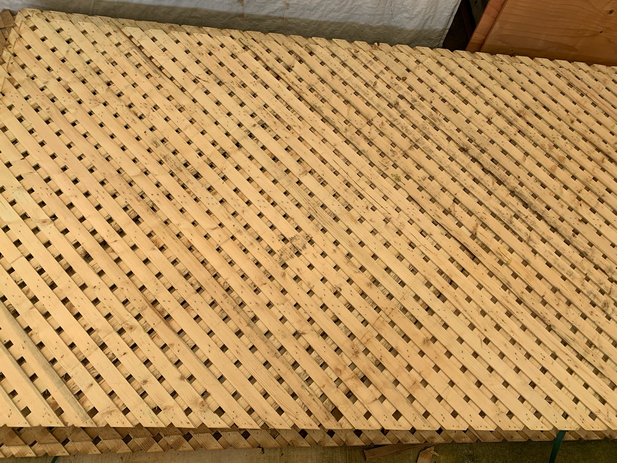 A wooden lattice privacy wall.