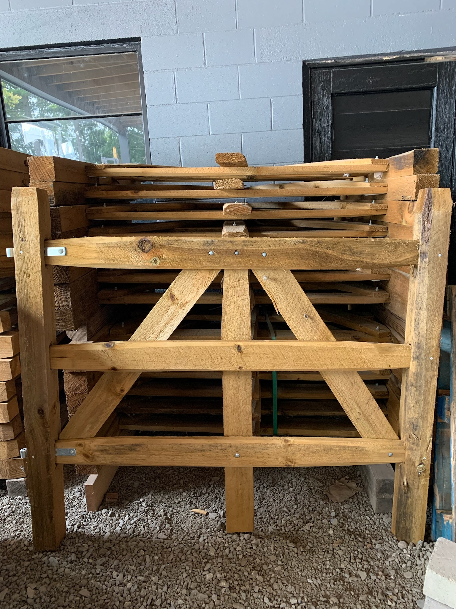 A larger, wooden split rail fence sample at Ladiesburg Lumber.