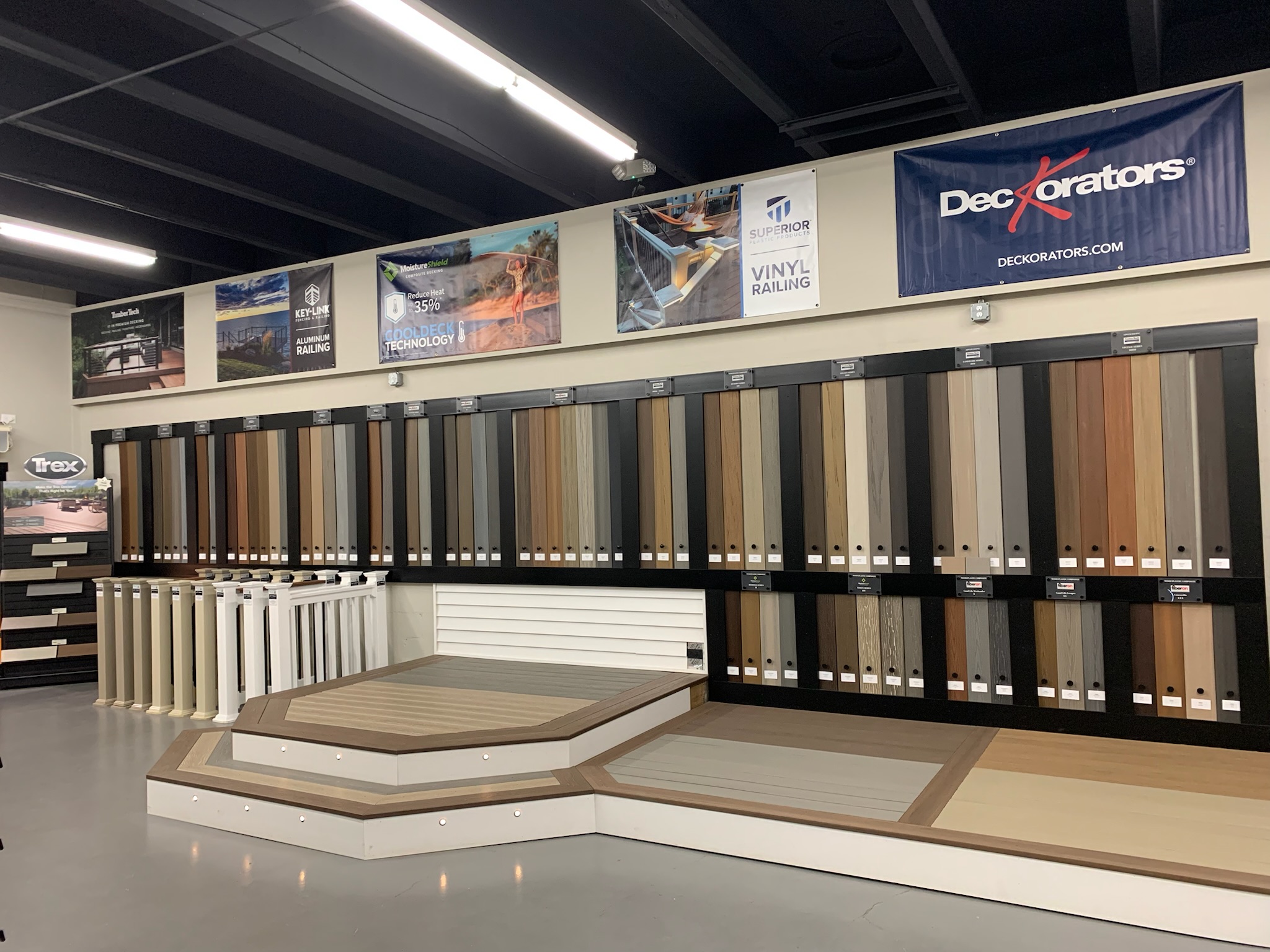 An entire wall of decking samples inside the Ladiesburg Lumber showroom.