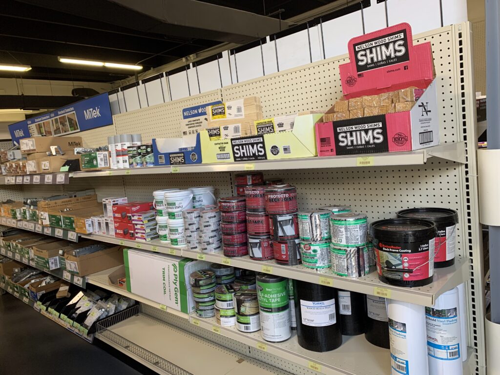 An aisle shot at Ladiesburg Lumber, featuring accessories for any type of deck situation.