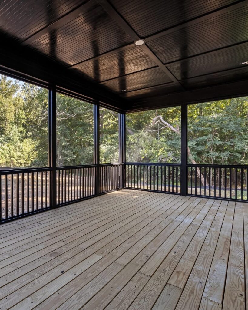 A shaded and enclosed deck designed and supplied by Ladiesburg Lumber.