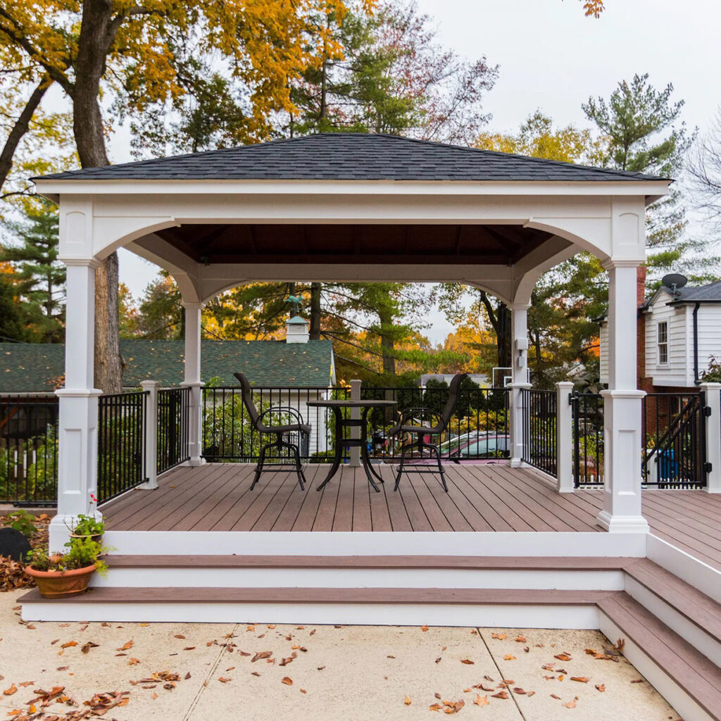 Looking out on an open deck with a small overhang for dining.