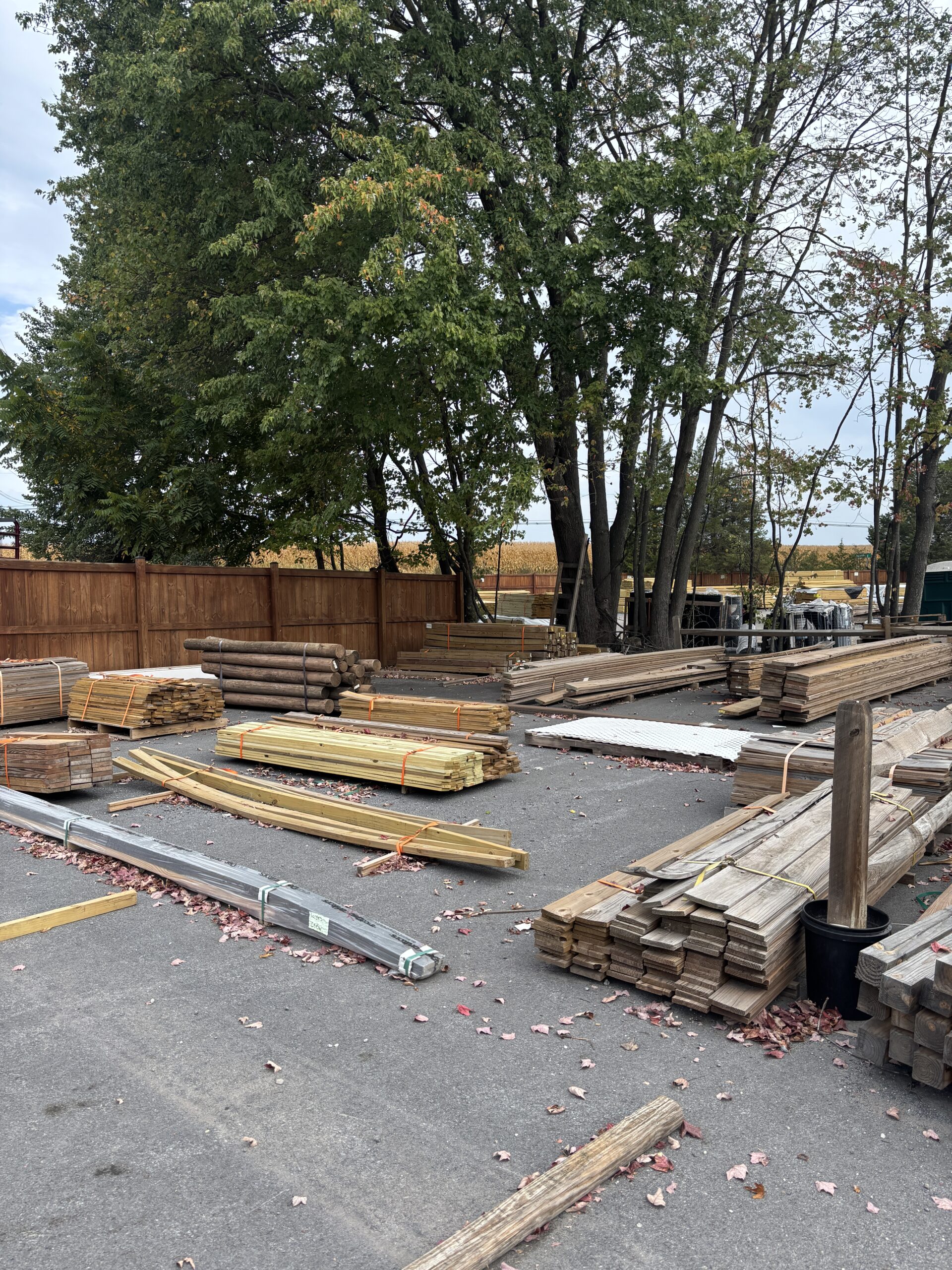 The Ladiesburg Lumber lumberyard, featuring various stacks of different types of wood fit for different projects.