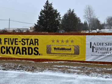 YellaWood sign outside with the Ladiesburg Lumber logo