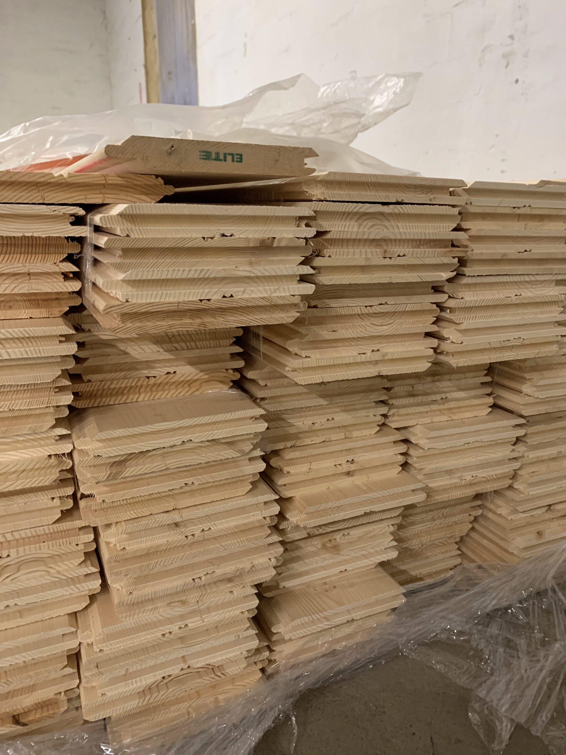 Elite branded shiplap boards, raw and unfinished.