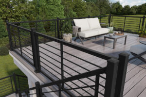 A large grey deck with black deck railings